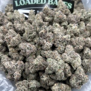 Close-up of Amarena Cherry Gelato cannabis flower with frosty trichomes and green-purple buds