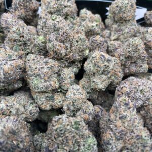 Close-up of ADL LCG cannabis flower with frosty green buds