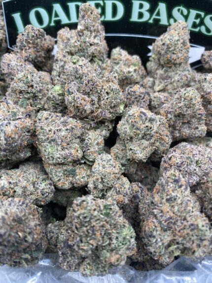 Close-up of ADL LCG cannabis flower with frosty green buds