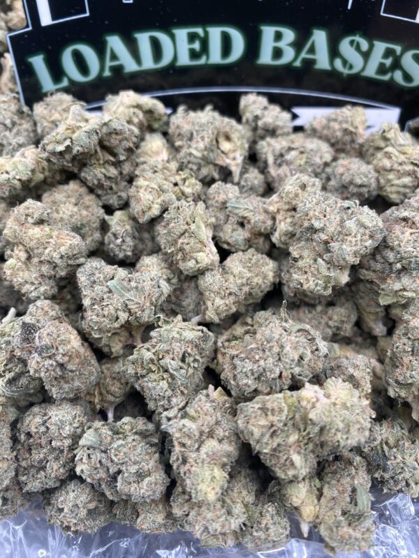 Close-up of Biscotti Smalls cannabis flower with frosty trichomes