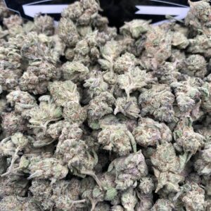 Cookie Melt Smalls cannabis flower buds with dense trichomes