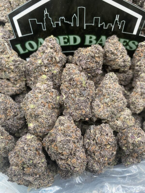 Ghost Runtz hybrid cannabis flower with frosty trichomes and purple-green buds