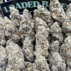 Grape Haze cannabis flower with purple-tinged dense buds and sparkling trichomes