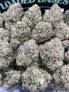 Gumbo cannabis flower hybrid buds with sweet bubblegum flavor and frosty trichomes.