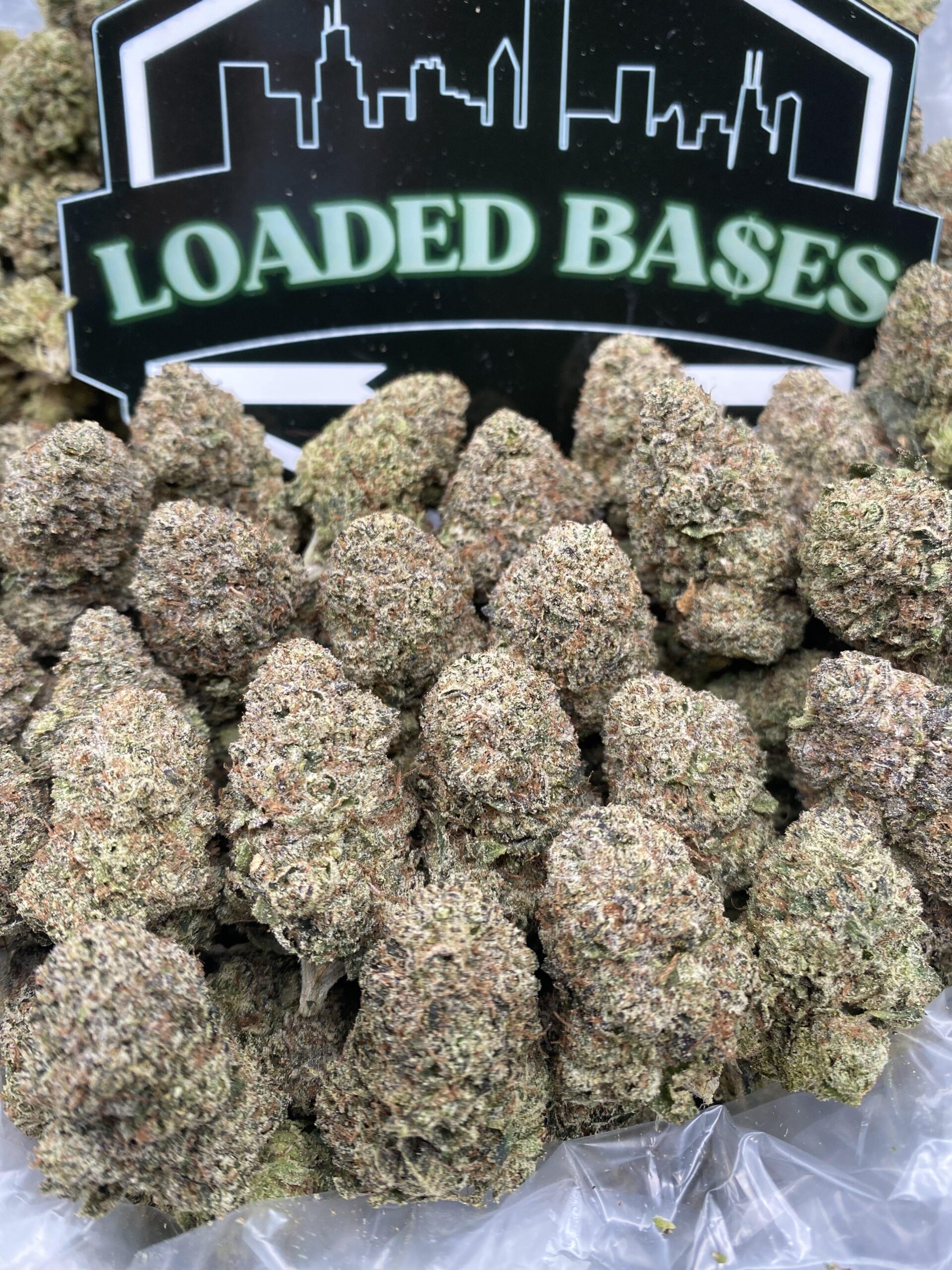 Gumbo Runtz cannabis flower hybrid buds with sweet bubblegum flavor and frosty trichomes.