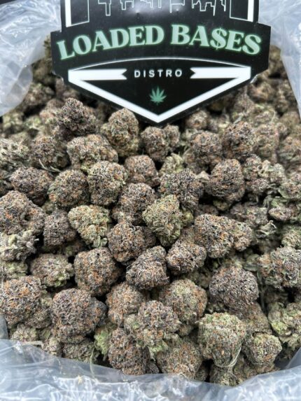 Melon Pop cannabis flower with frosty melon-colored buds