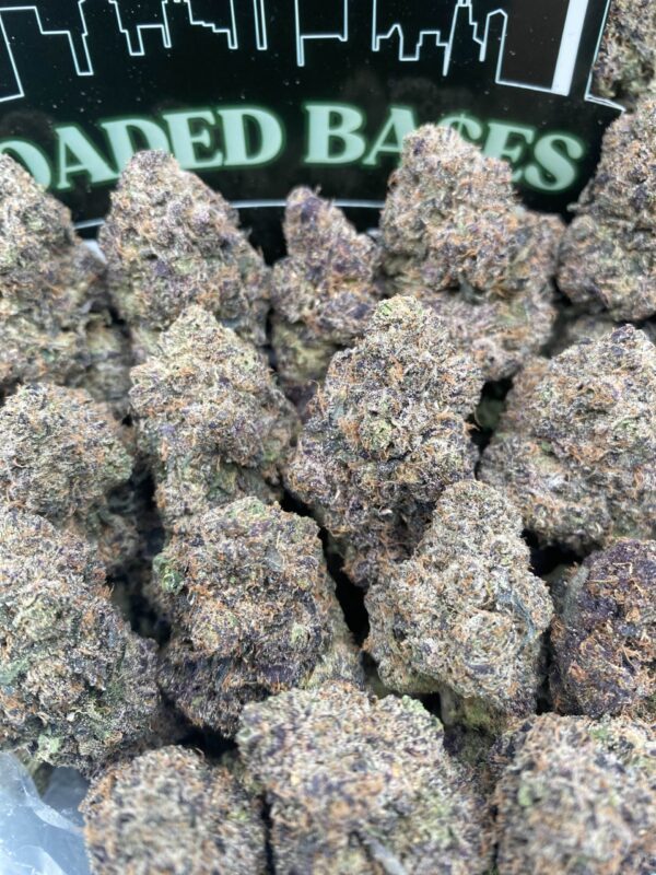 Mochilato cannabis flower with frosty trichomes and colorful buds