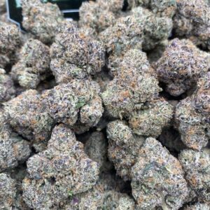 Pink Runtz cannabis flower with frosty pink-hued buds