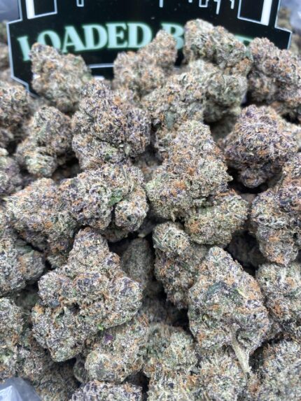 Pink Runtz cannabis flower with frosty pink-hued buds