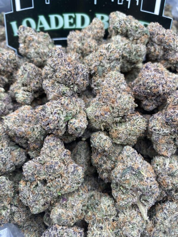 Pink Runtz cannabis flower with frosty pink-hued buds