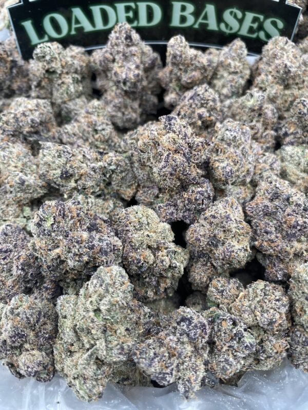 Supreme Runtz cannabis flower with frosty trichomes and vibrant colors