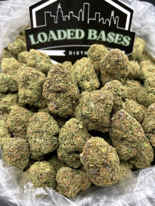 Wedding Cake hybrid cannabis flower with frosty trichomes and sweet aroma